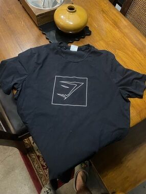 Gymshark Black Short Sleeve Tee with White Shark-Outline Graphic